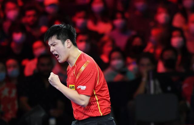 开云下载-樊振东生涯首夺世乒赛男单冠军 国乒实现九连冠